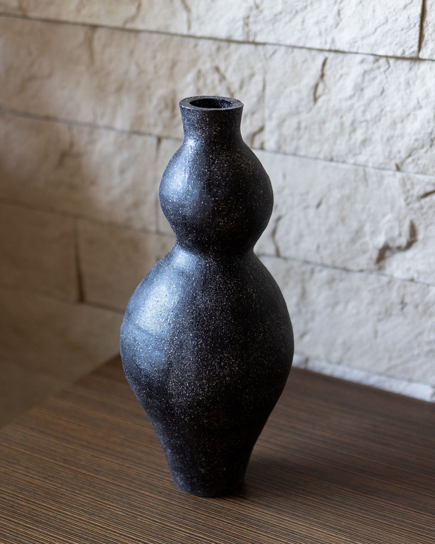 Black charcoal vase