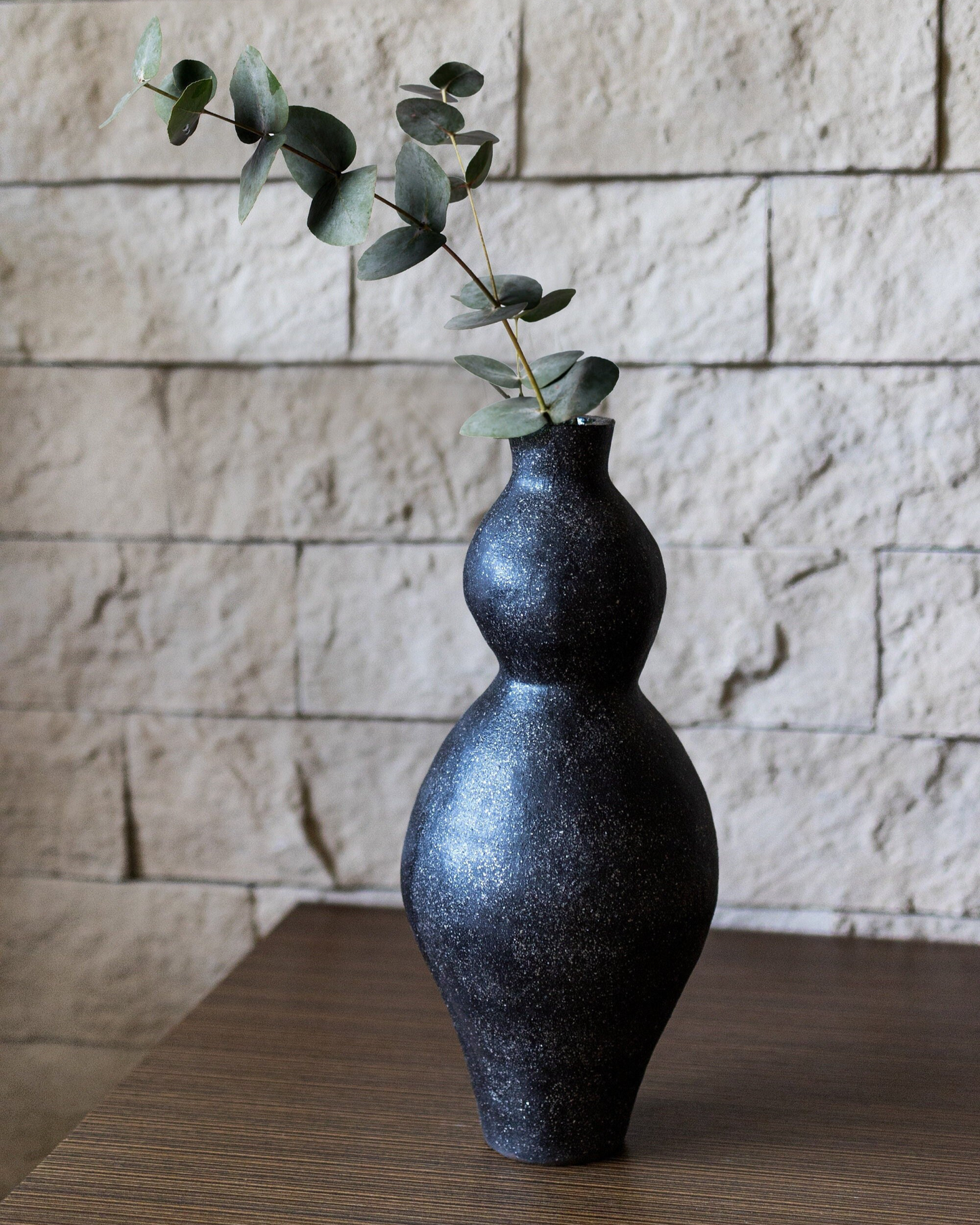 Black charcoal vase