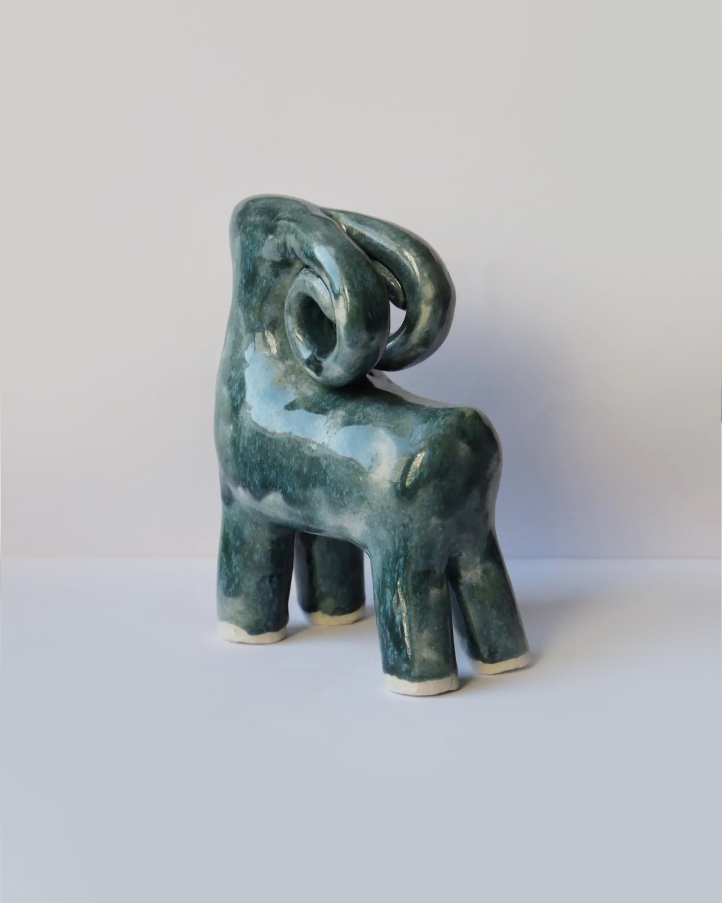 Ceramic blue-green ram