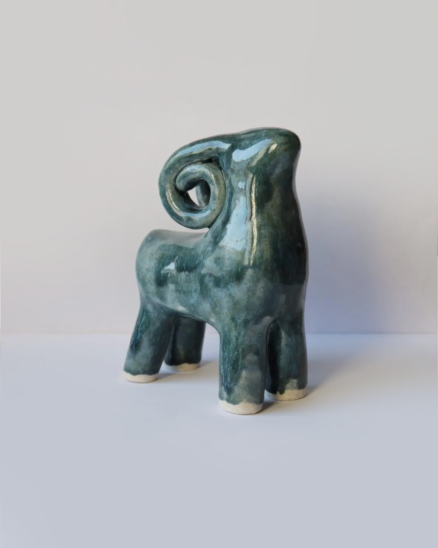 Ceramic blue-green ram