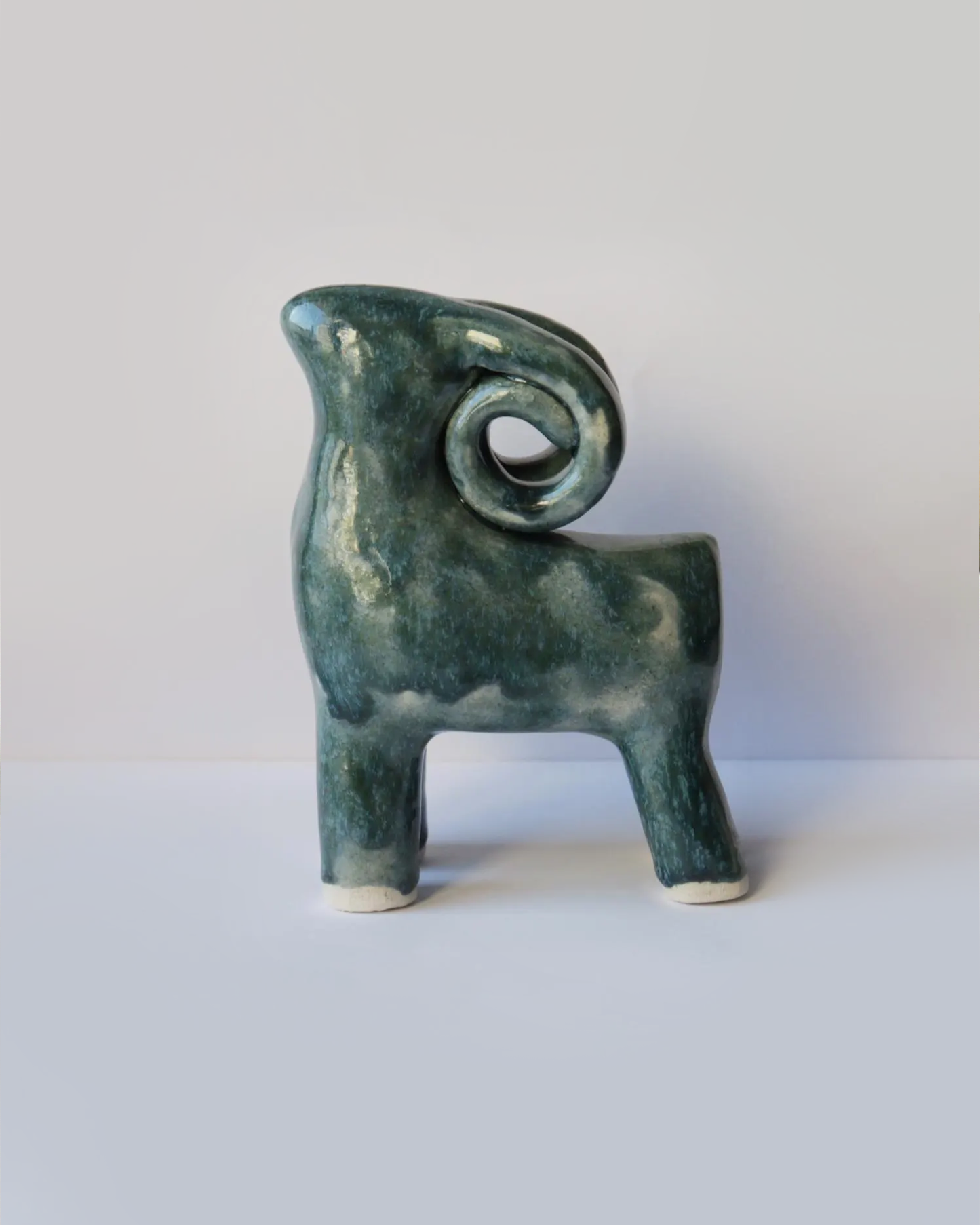 Ceramic blue-green ram