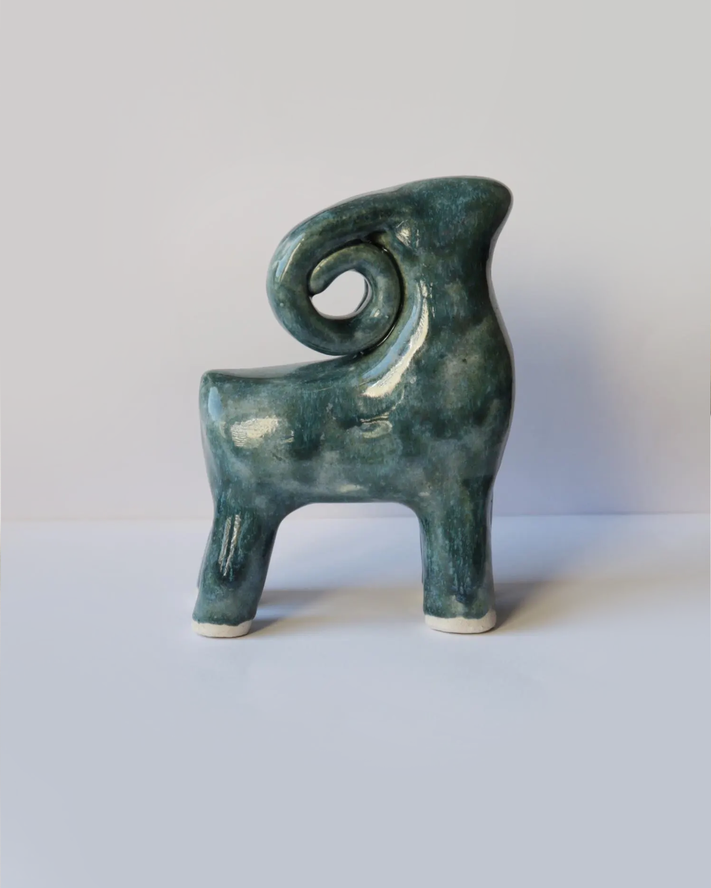 Ceramic blue-green ram