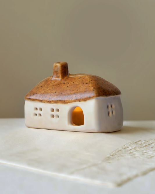 Ceramic house with brown roof