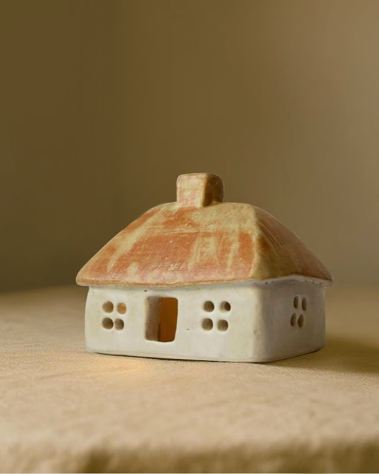 Ceramic house with beige-orange roof